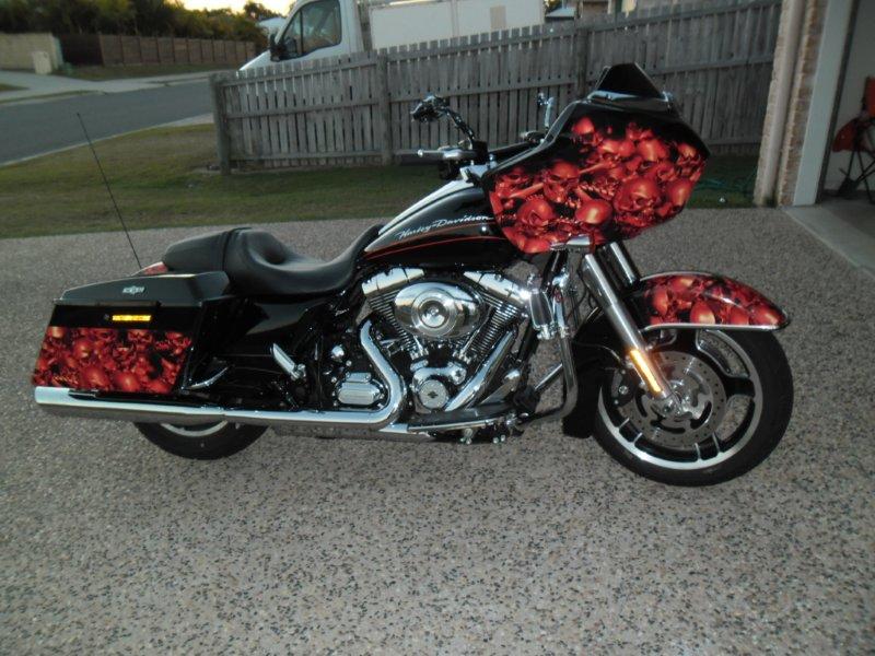 red skulls decals on black motorcycle
