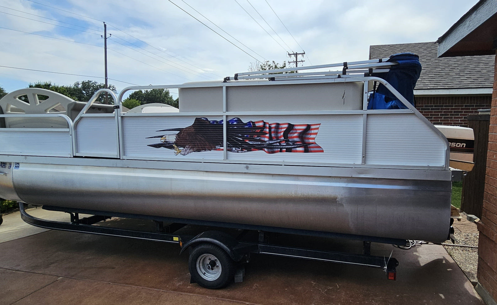 american flag bald eagle decal on the side of pantoon boat