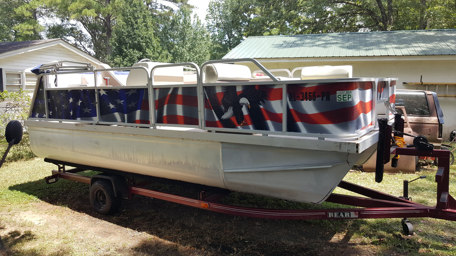 american flag wrap on pantoon boat