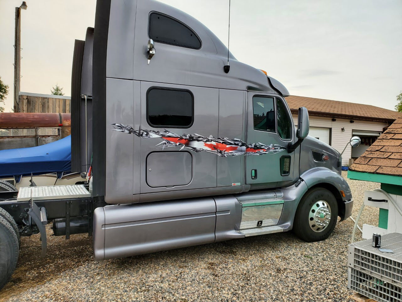 Canada flag tear vinyl graphics on semi trailer truck
