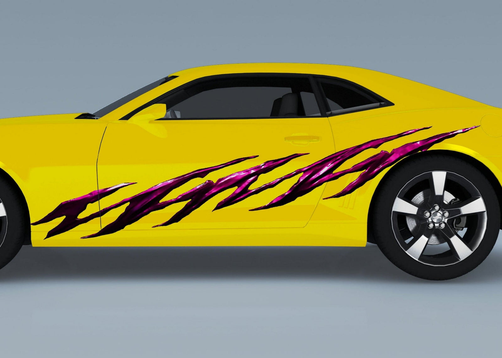 yellow Camaro car with jagged megenta vinyl decal on its side