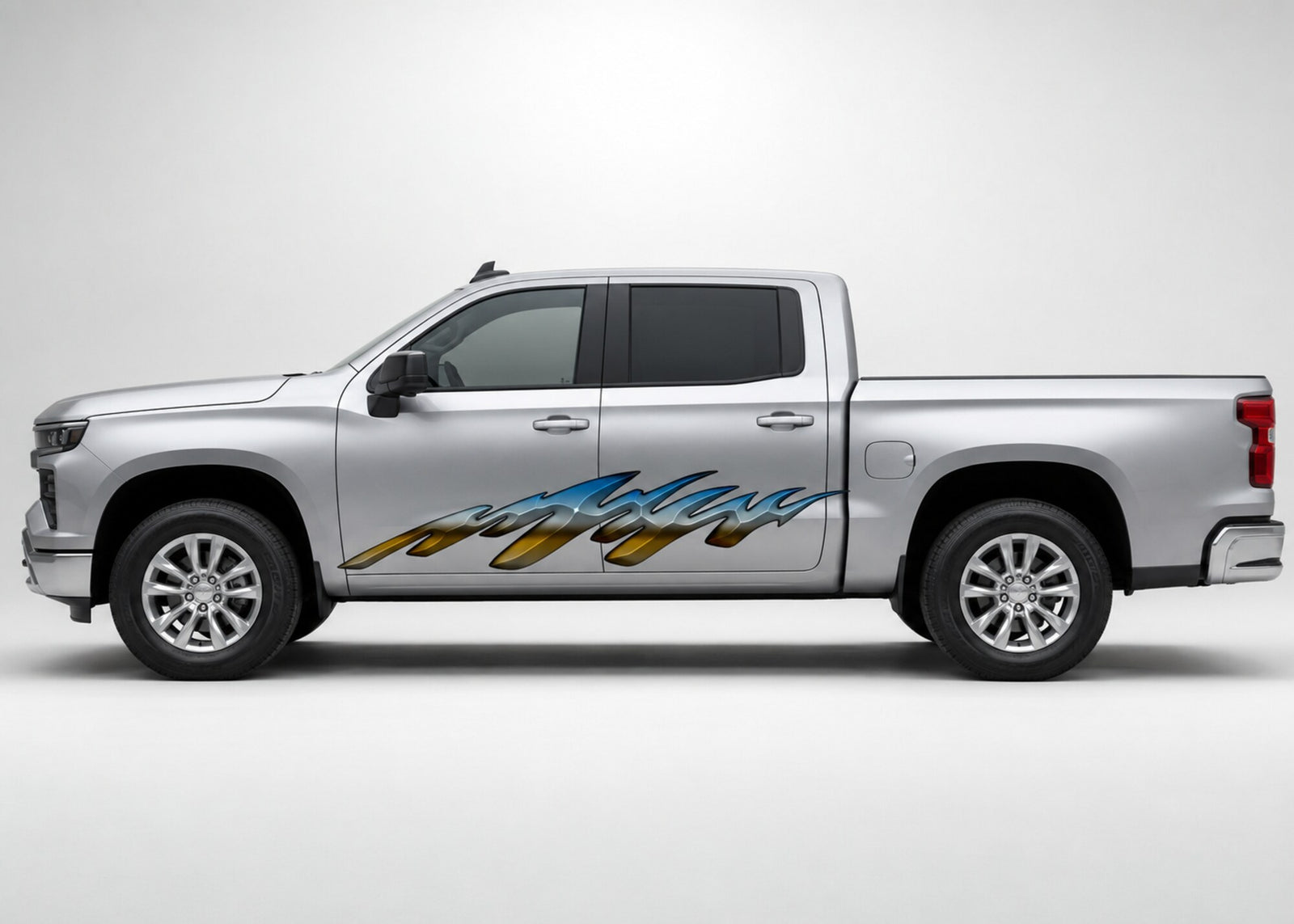 Horizon Edge blue, silver-grey and gold vinyl graphic displayed across the driver-side doors of a silver four-door pickup truck.