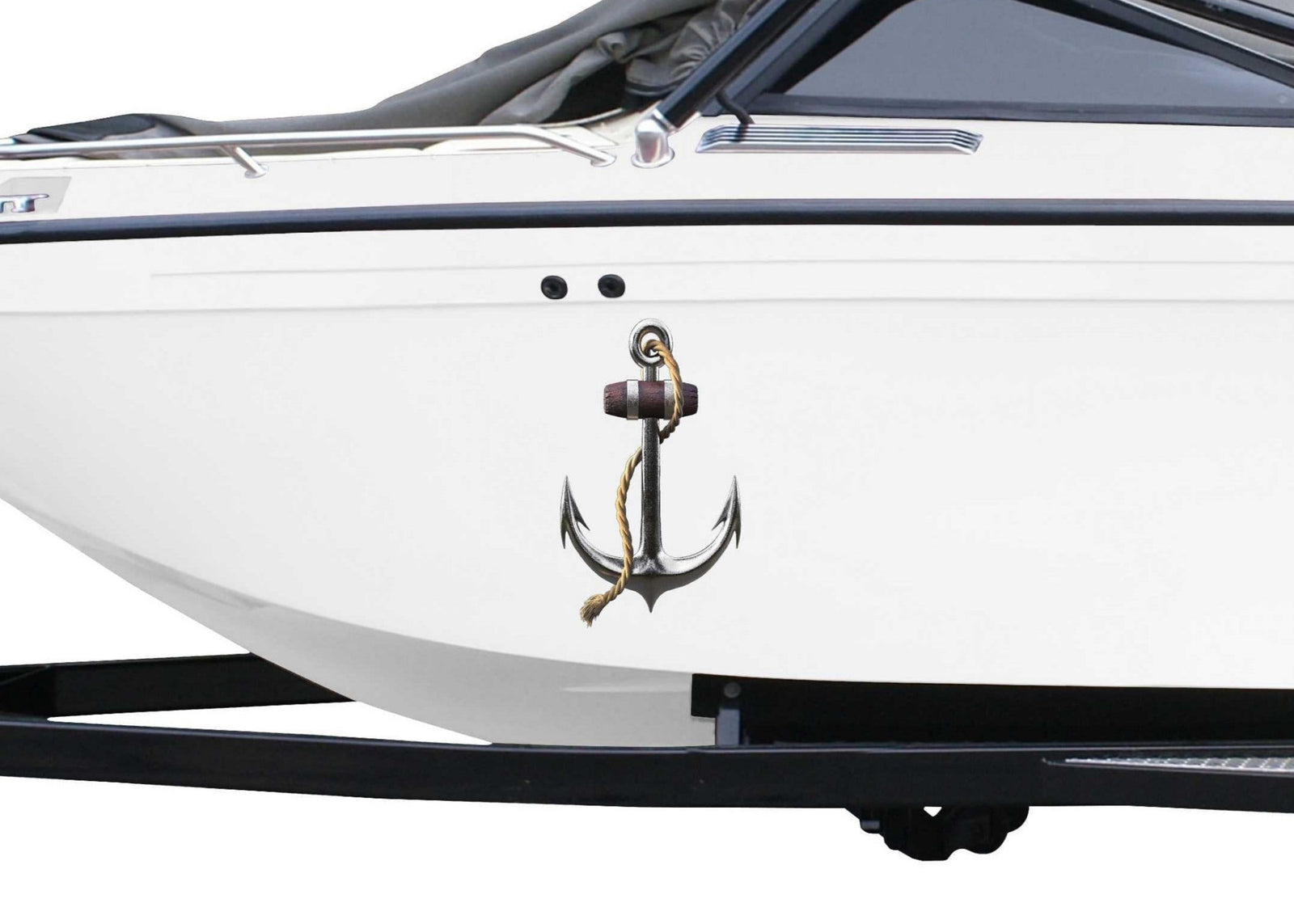 White boat with Silver anchor decal on the side of it