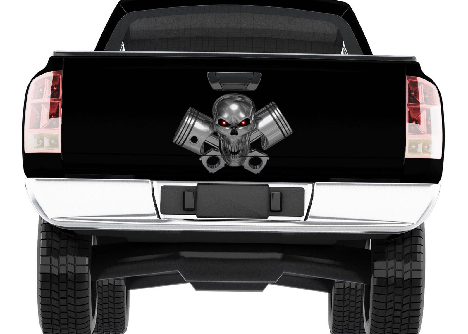 Chrome skull pistons tailgate decal centered on black pickup truck