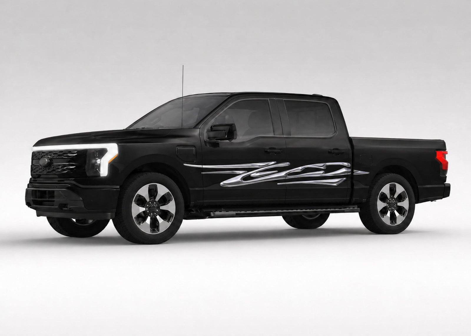 black pickup with chrome blade streak vinyl graphics on driver side