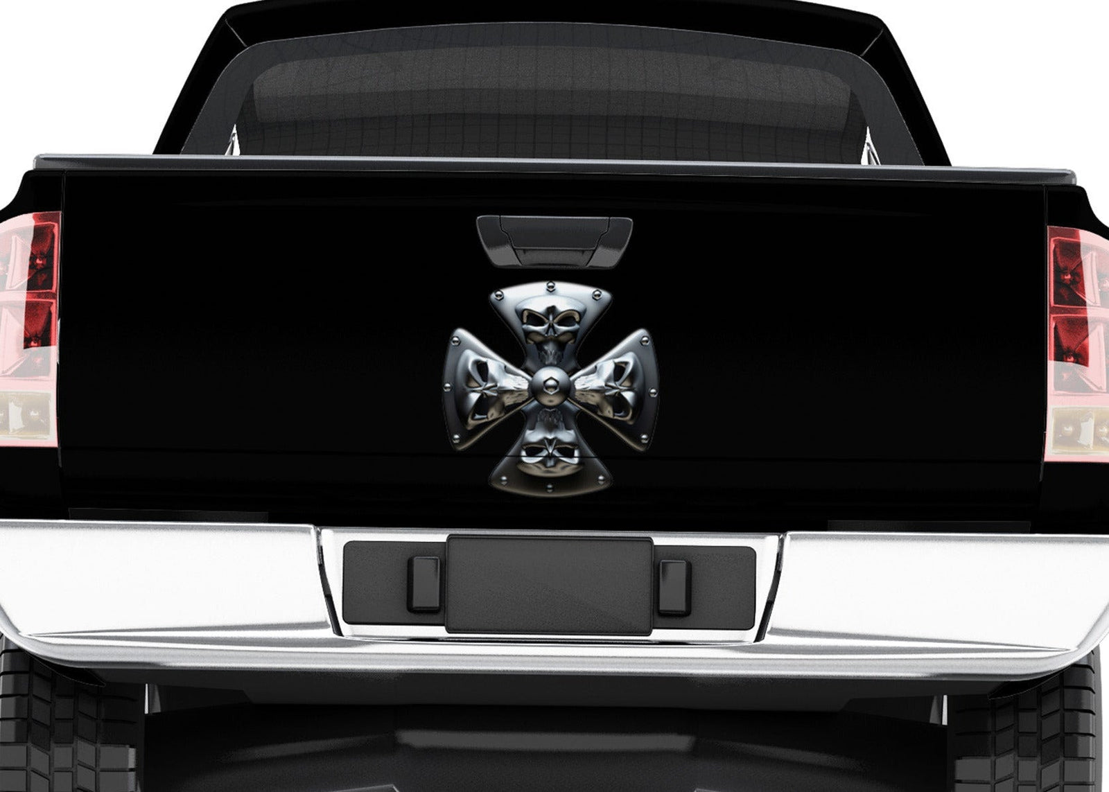 black truck tailgate door with chrome skull maltese cross vinyl graphics on it