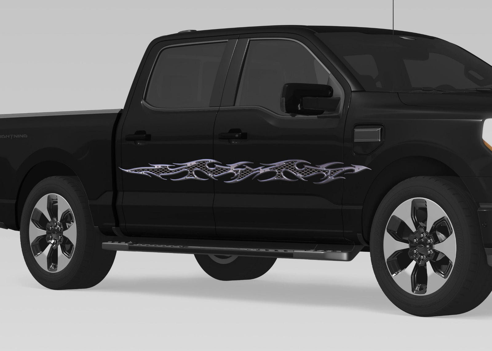 black truck with metal style tribal flames vinyl graphics on driver side