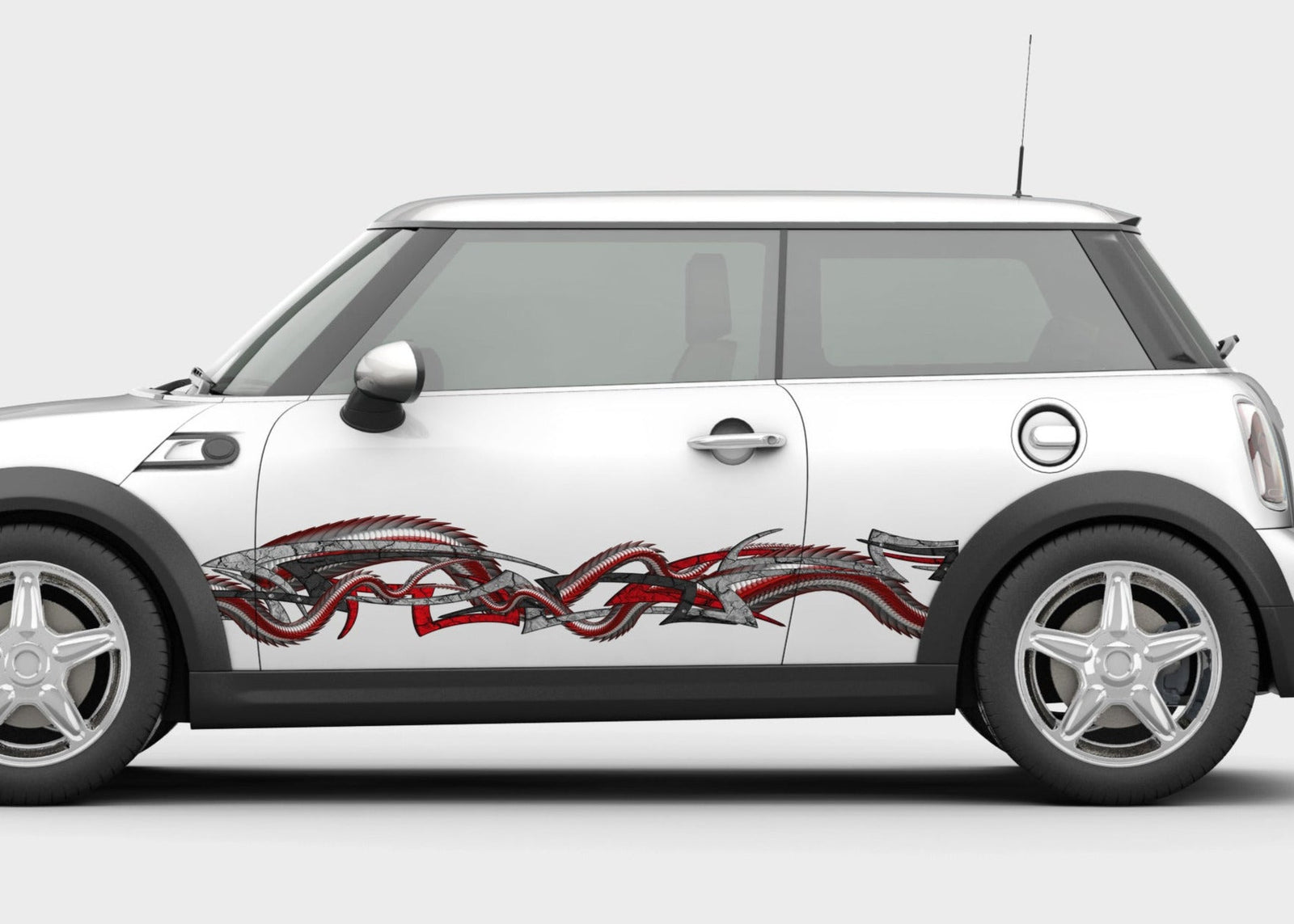 dragon tribal decal on the side of mini cooper car