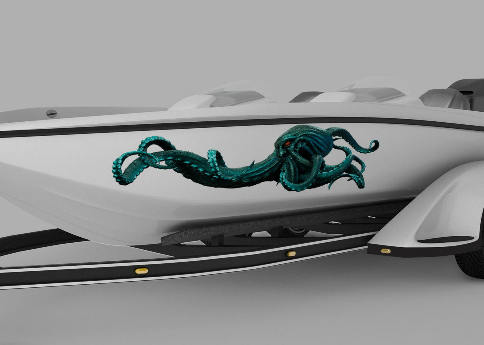 kraken sea monster vinyl graphics on the side of a white boat