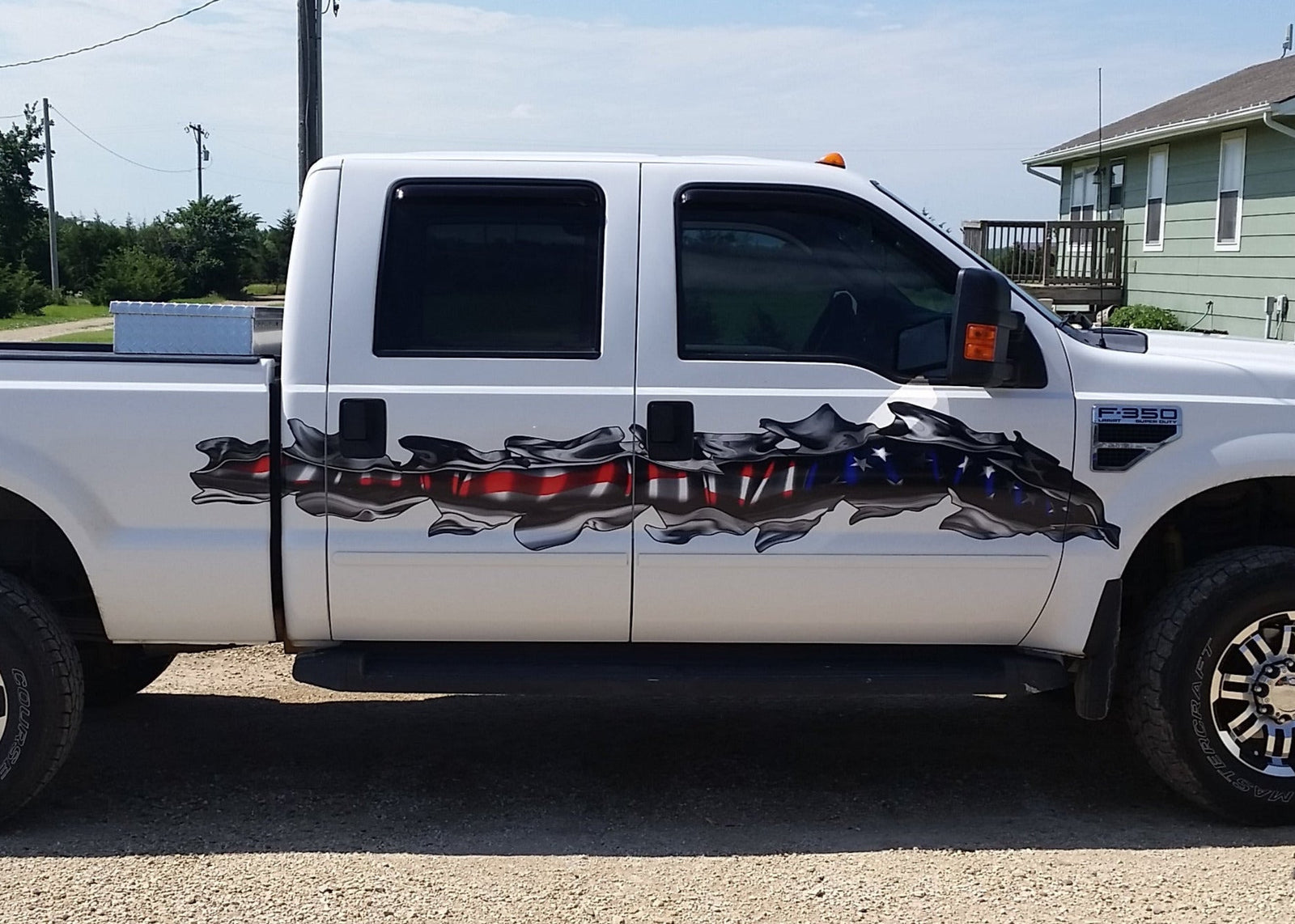 usa flag tear decal on ford f350 truck passenger side