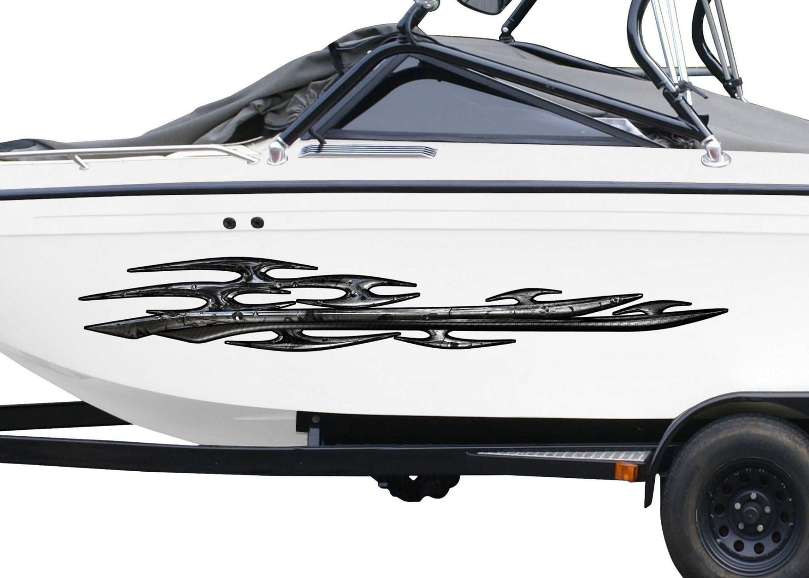 white boat with tribal dark metallic style vinyl decal on its side