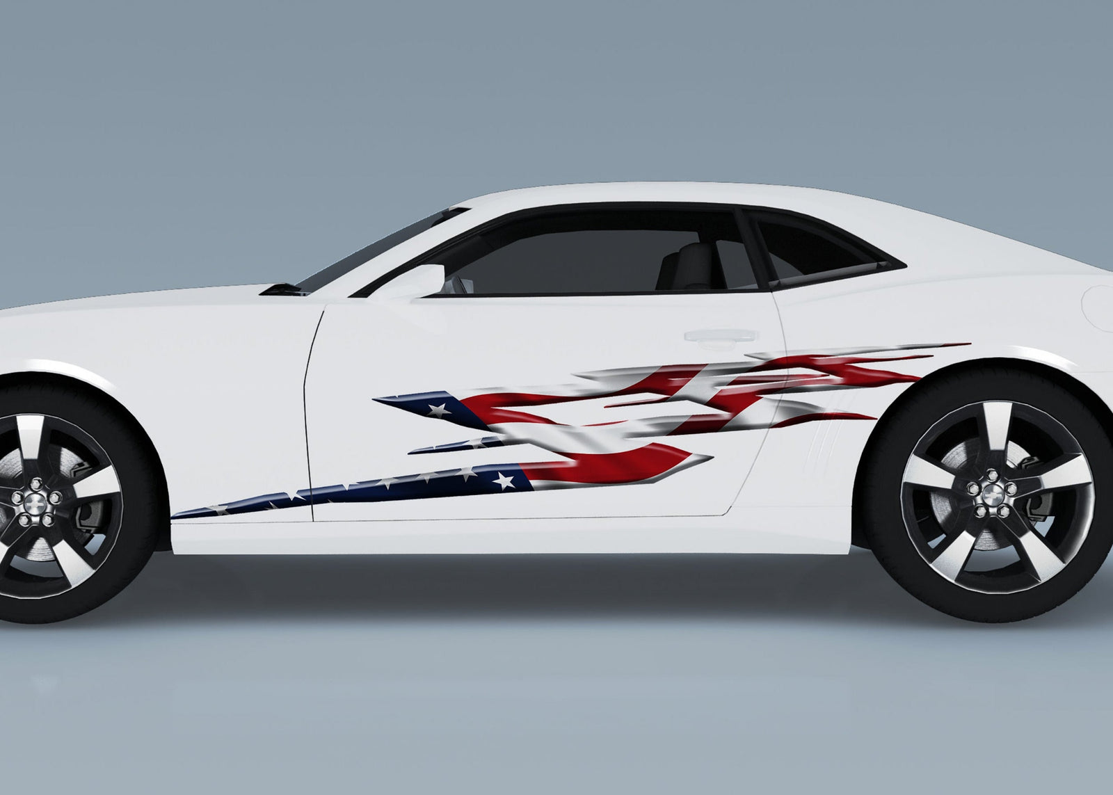 white camaro sports car with american flag spearfire flames vinyl graphics on driver side
