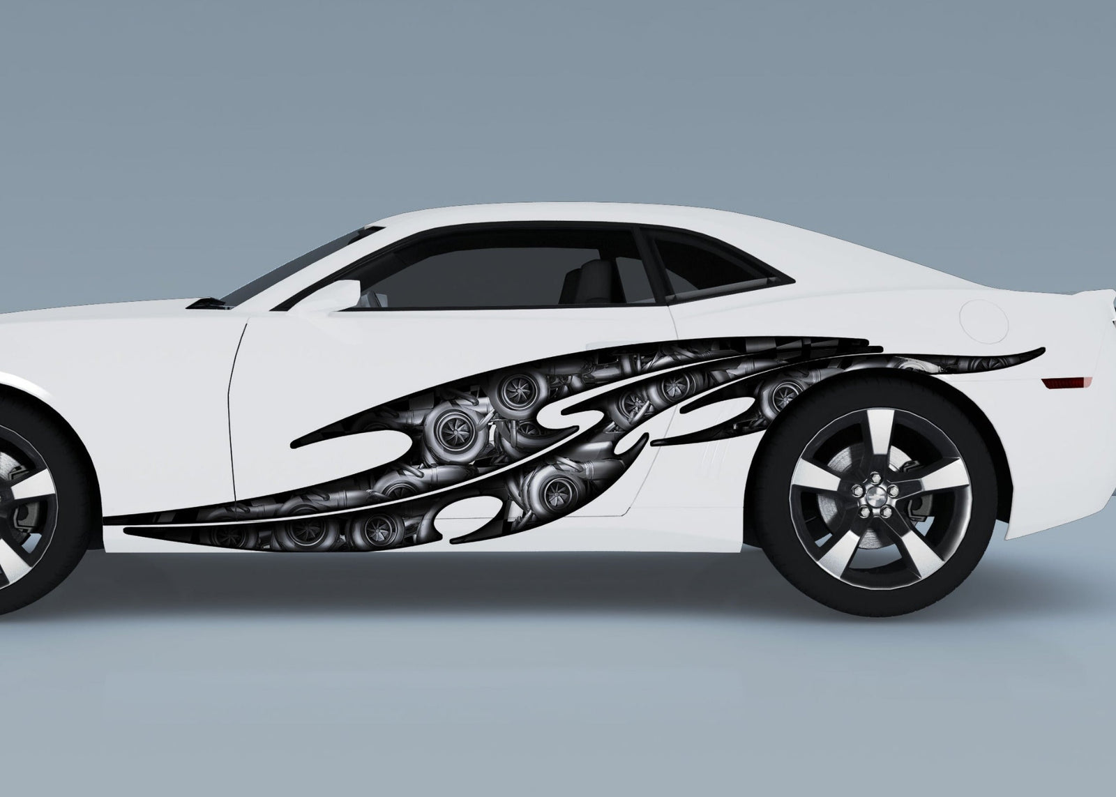 white camaro with tribal steam punk decal on driver side