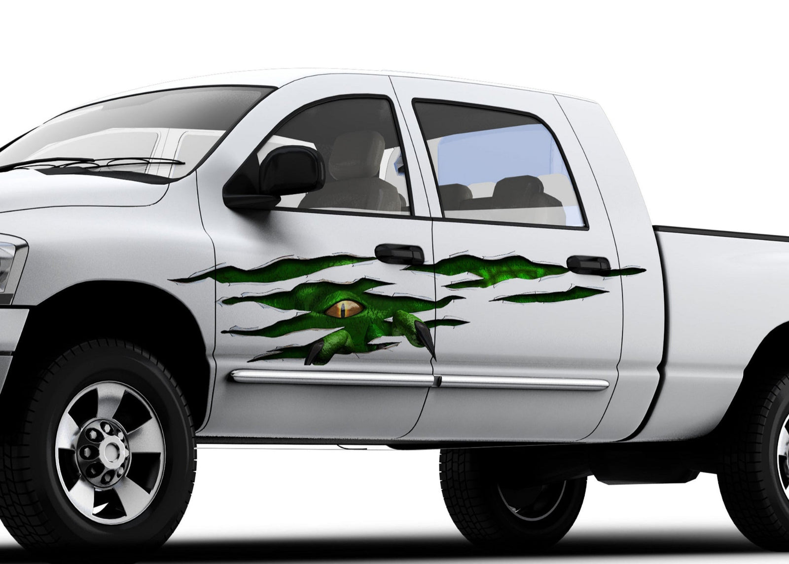 white pickup with Green Monster Rip tear vinyl graphics on driver side