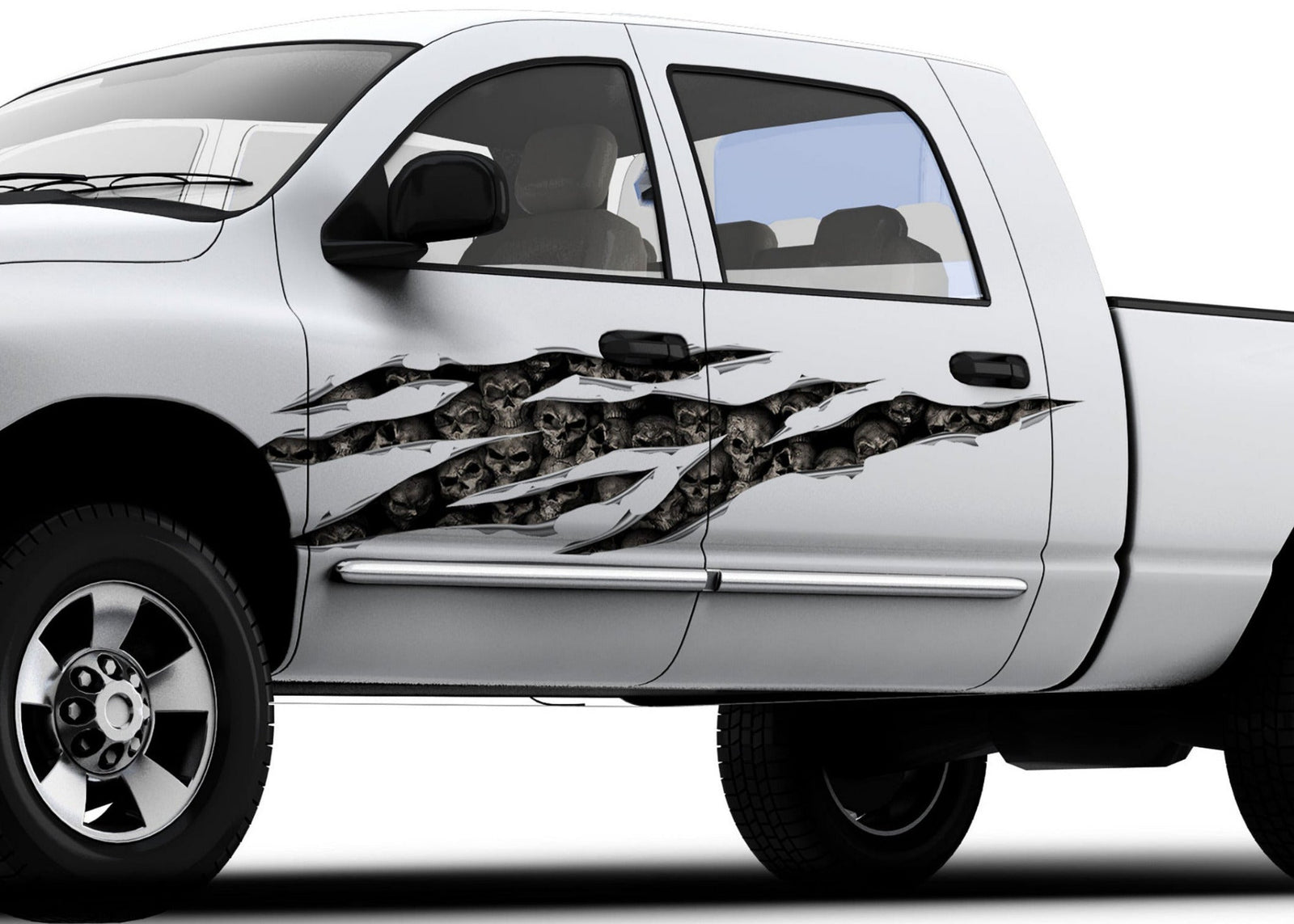 white truck with skulls big rip decal on driver side
