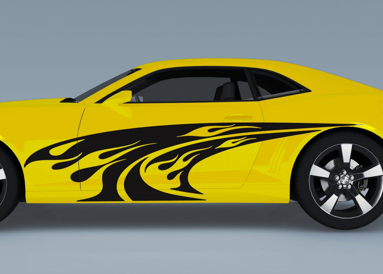 yellow camaro sports car with black flames splash decals on its side