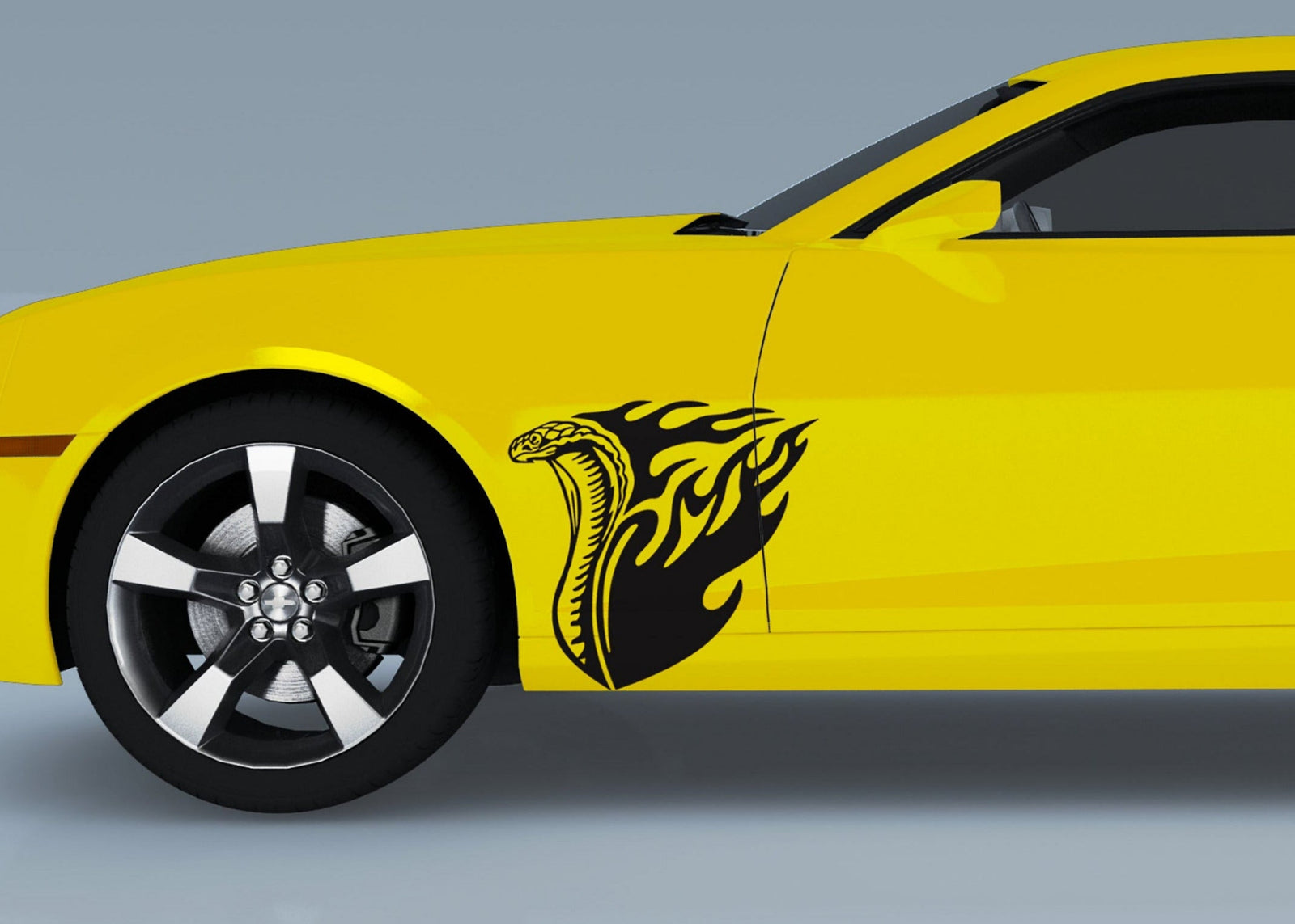Yellow muscle car with a black cobra flames design on its front side