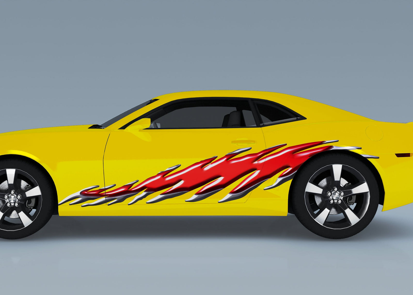 yellow camaro with red flamesurge vinyl graphics on driver side