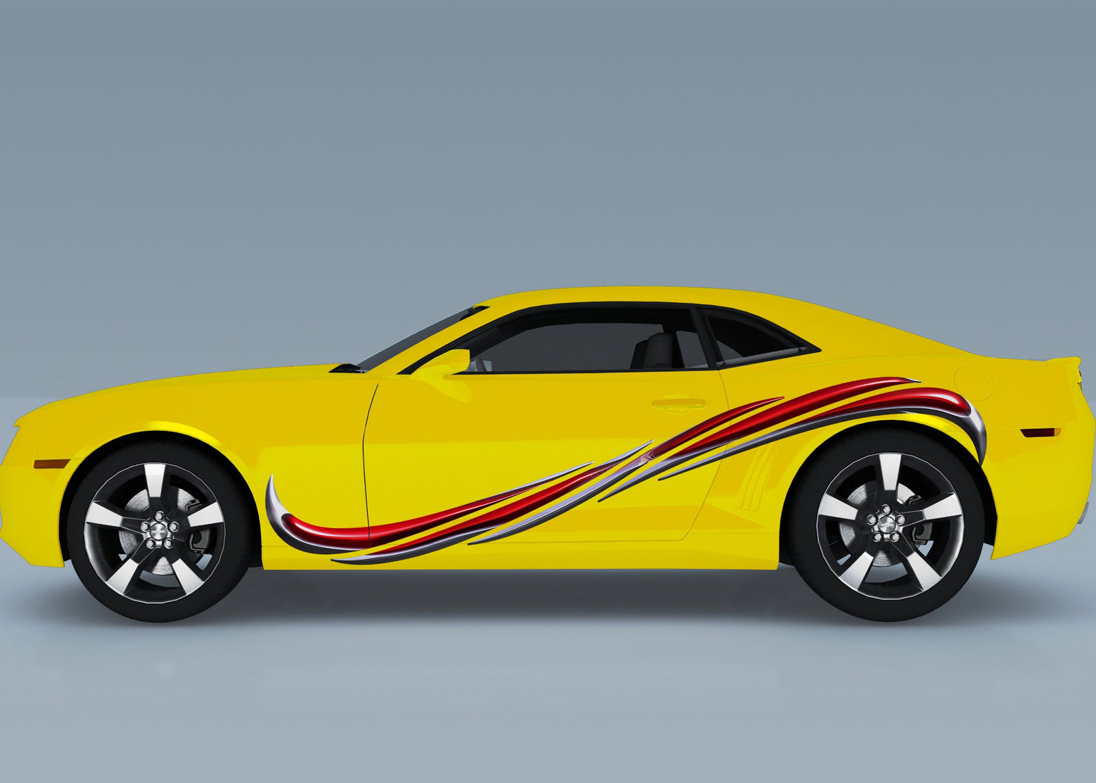 yellow camaro with red chrome hookwave vinyl decal on driver side