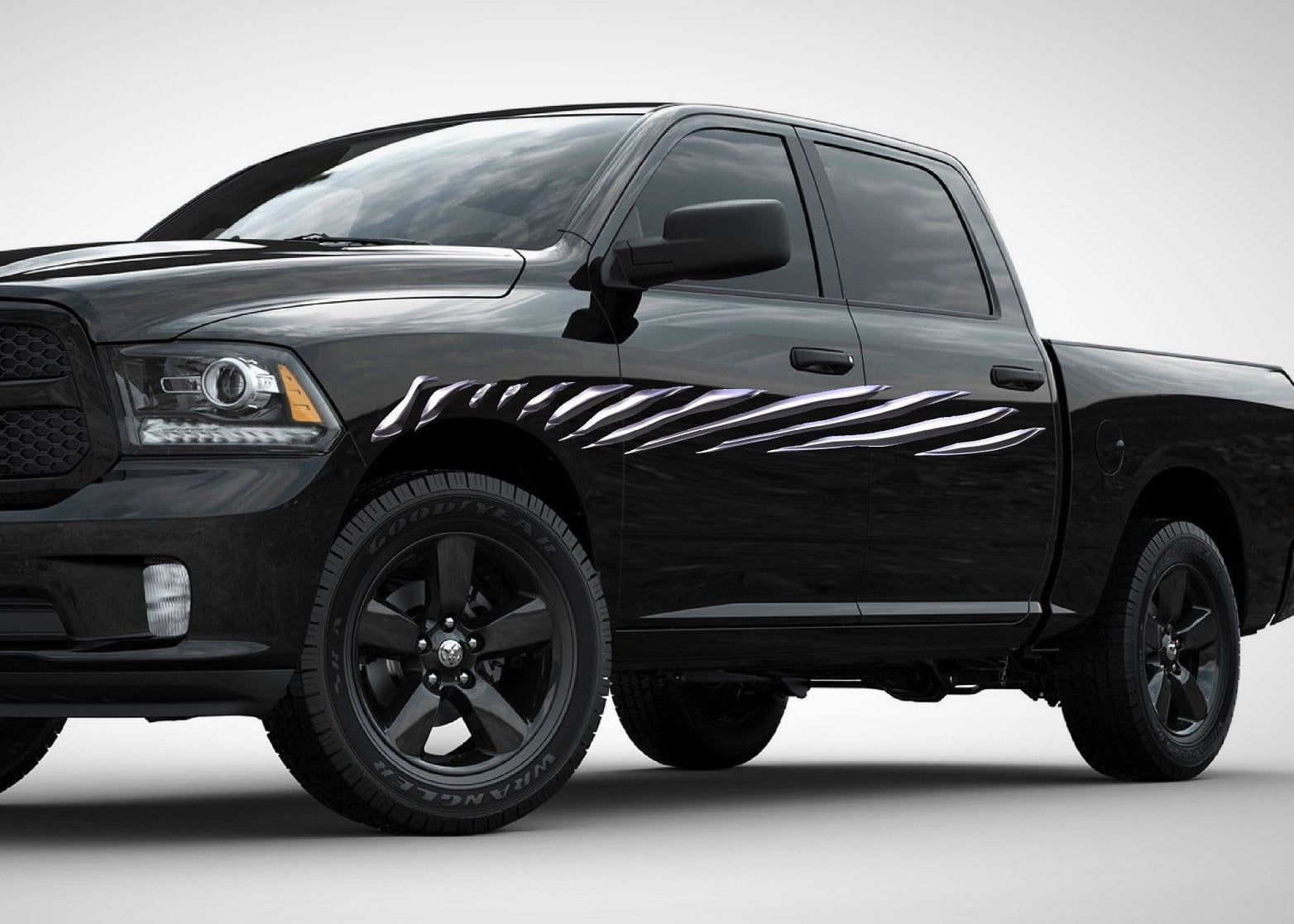 black truck with chrome shard stripes vinyl graphics on driver side