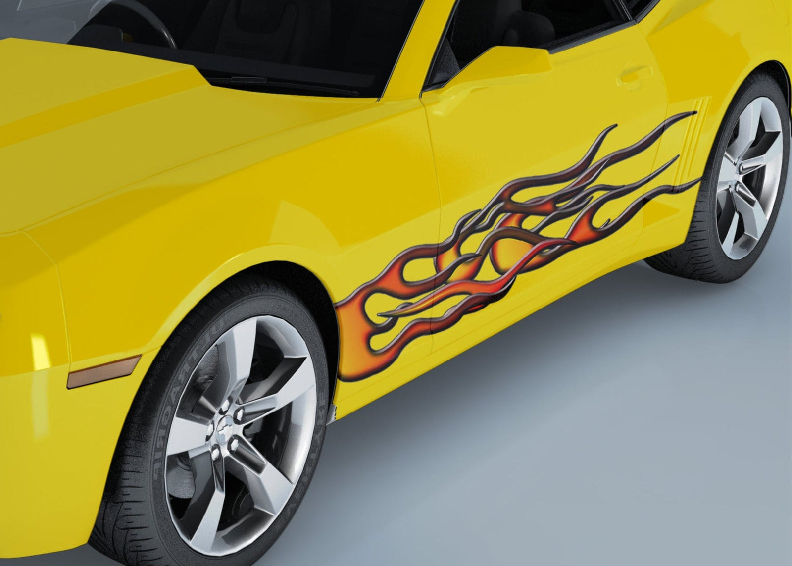 orange fury flames vinyl decal on yellow camaro sports car