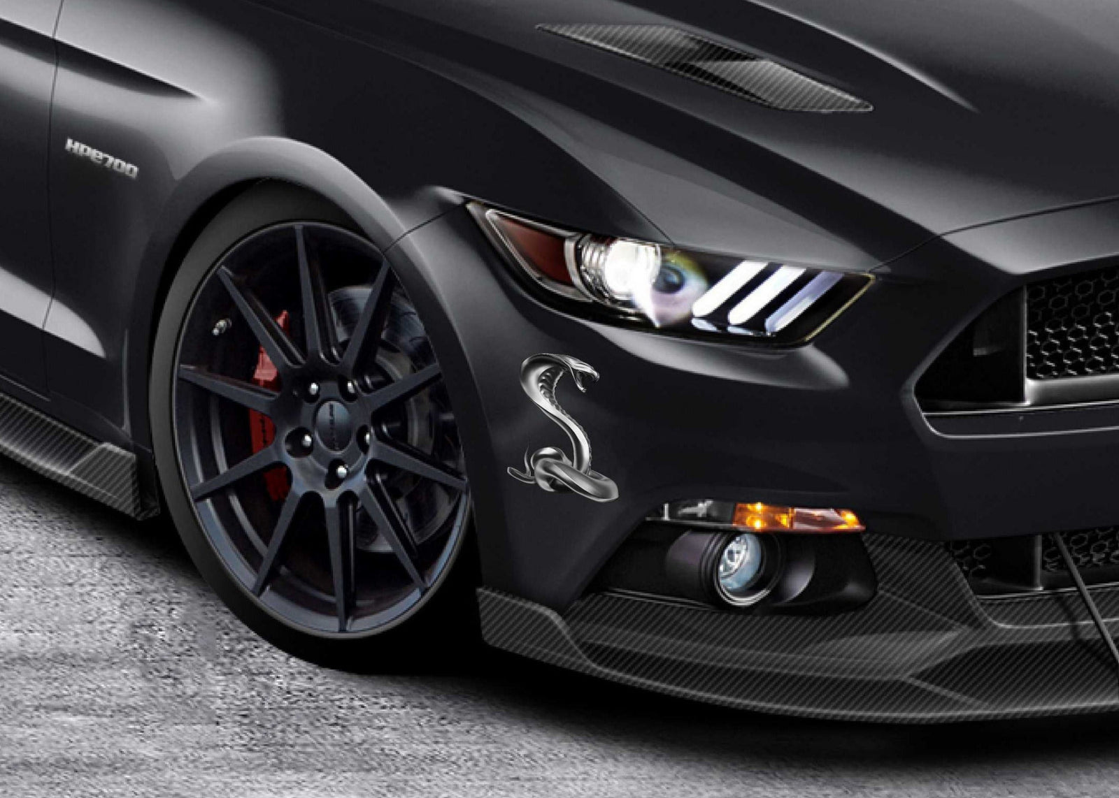 sliver cobra graphic sticker on black ford mustang