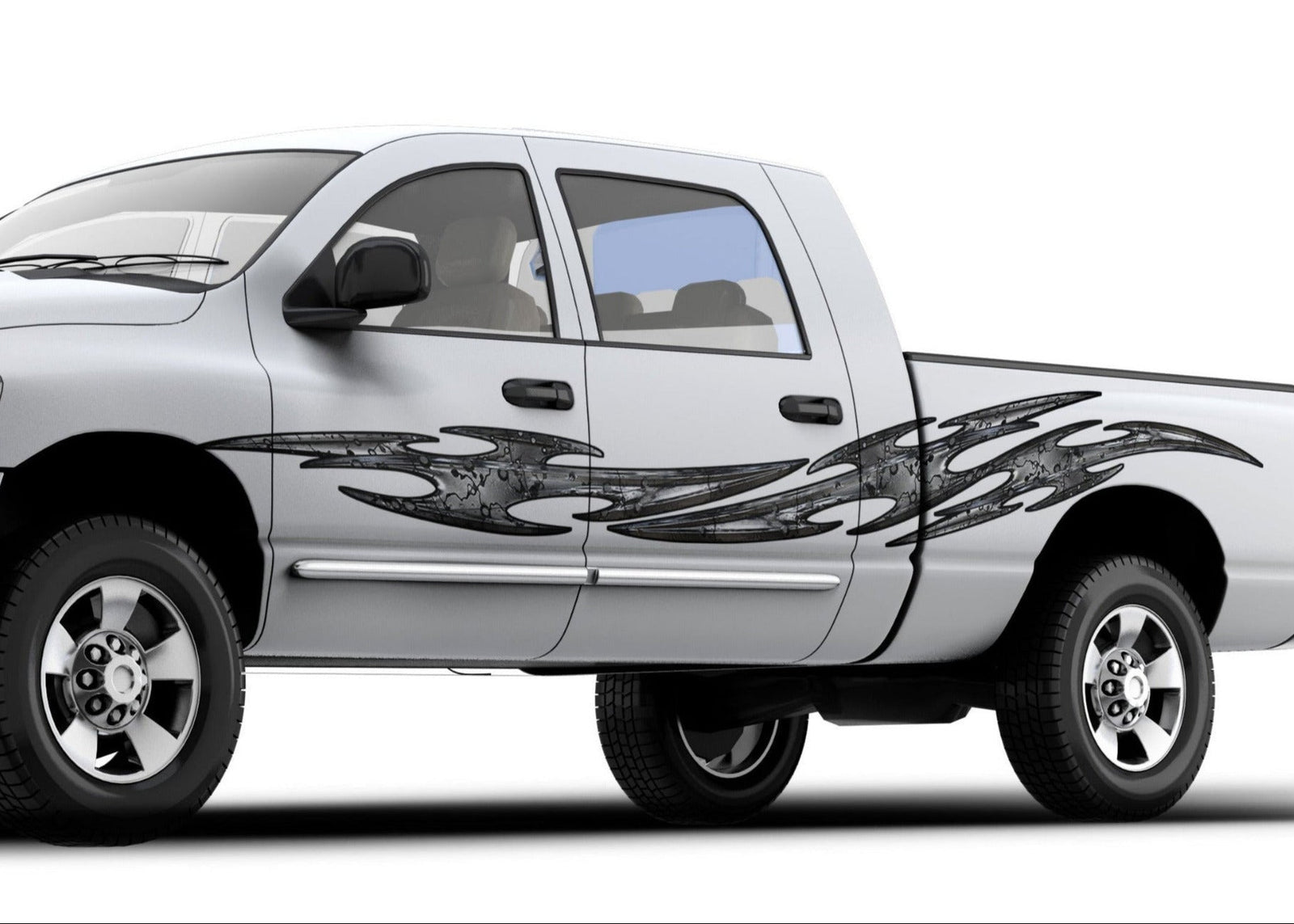 white pickup with grey tribal flares vinyl graphics on driver side