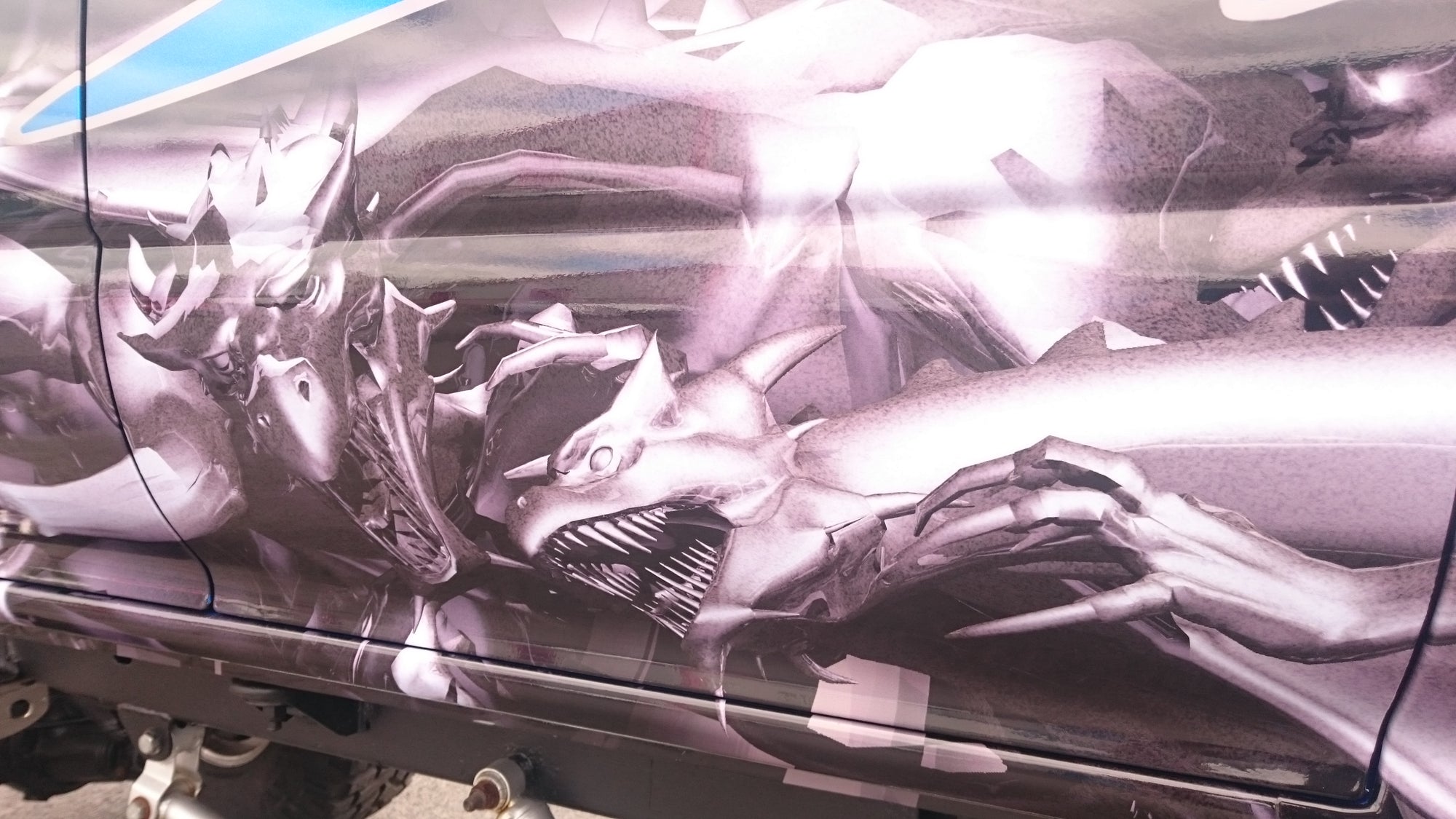 dragon wrap on the side of truck 