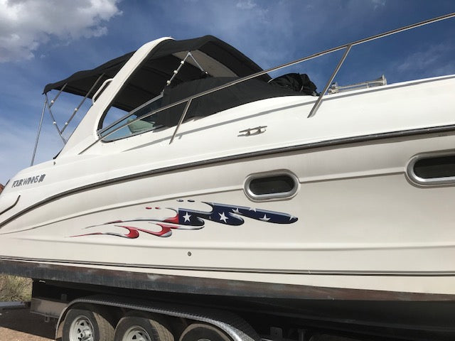 American flag waving stripe decal on the side of a white boat