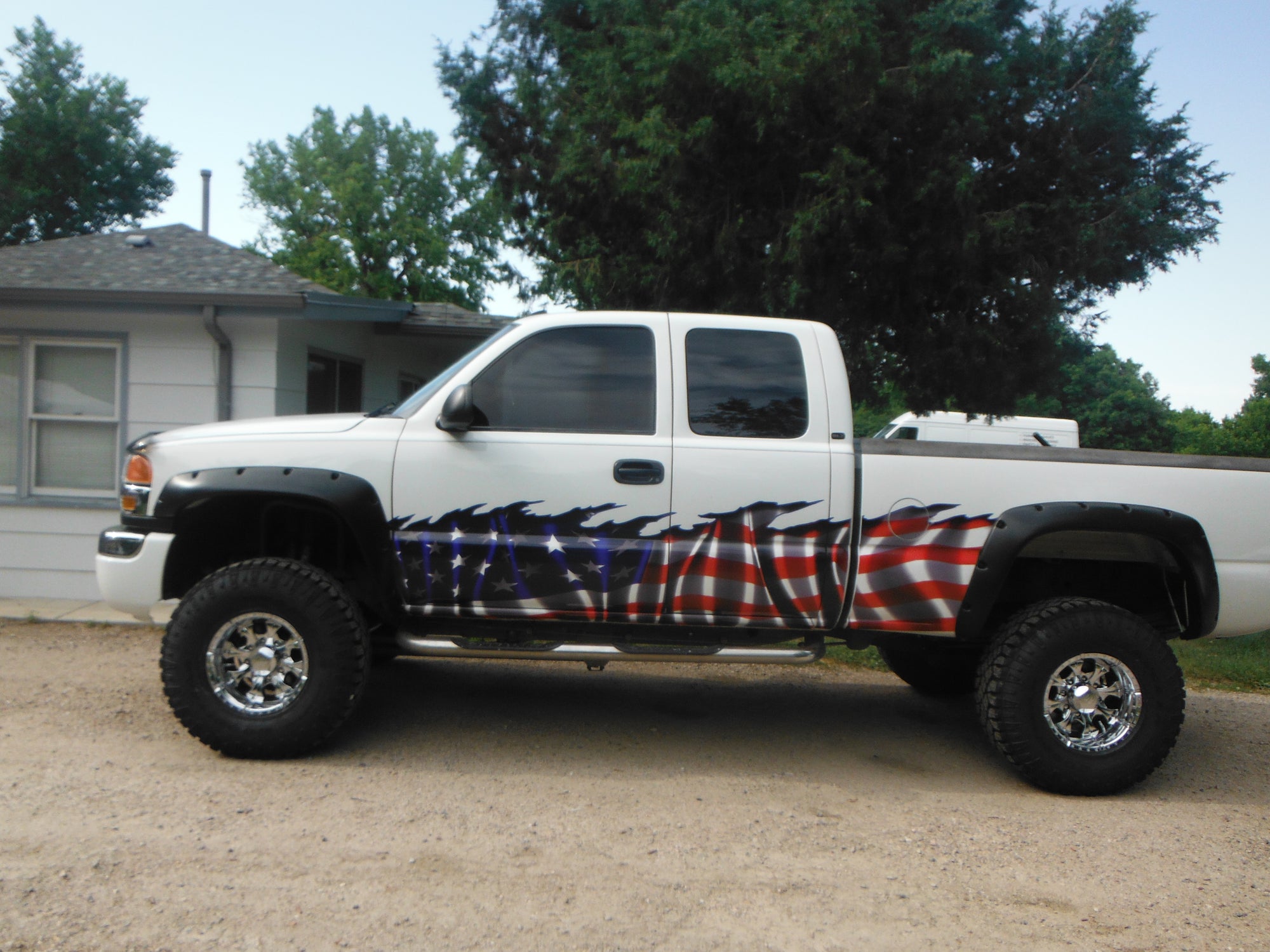 american flag truck wrap on white pick-up truck