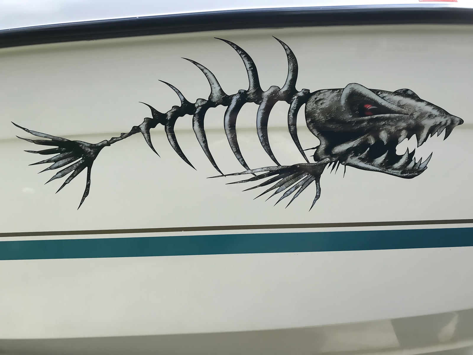 photo of monster fish decal on customers boat  xtreme digital graphix -  Xtreme Digital GraphiX