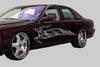 96 chevy impala with silver impala flames decal on driver side
