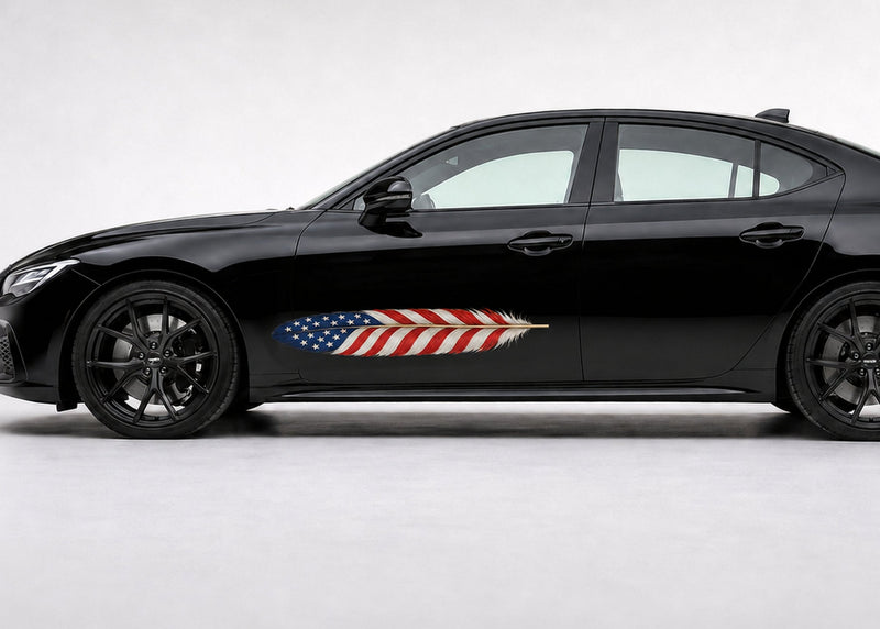 Black sedan in driver-side profile with a small American flag feather decal placed on the lower front door behind the front wheel.
