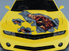 Orange dragon tear hood decal installed on yellow car hood with chrome ripped metal effect