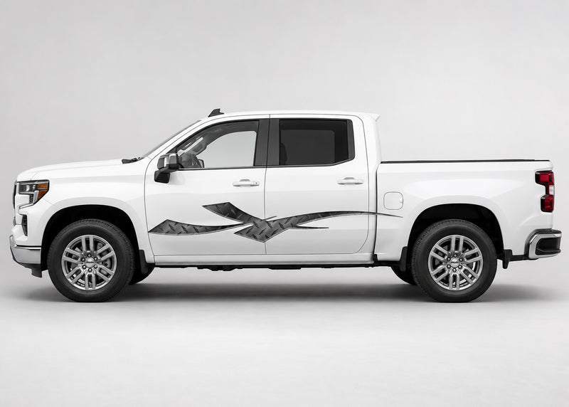Silver and black Diamond Plate Strike vinyl graphic displayed along the driver side of a white four-door pickup truck.