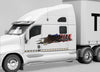White semi truck with a bald eagle american flag design on the driver side