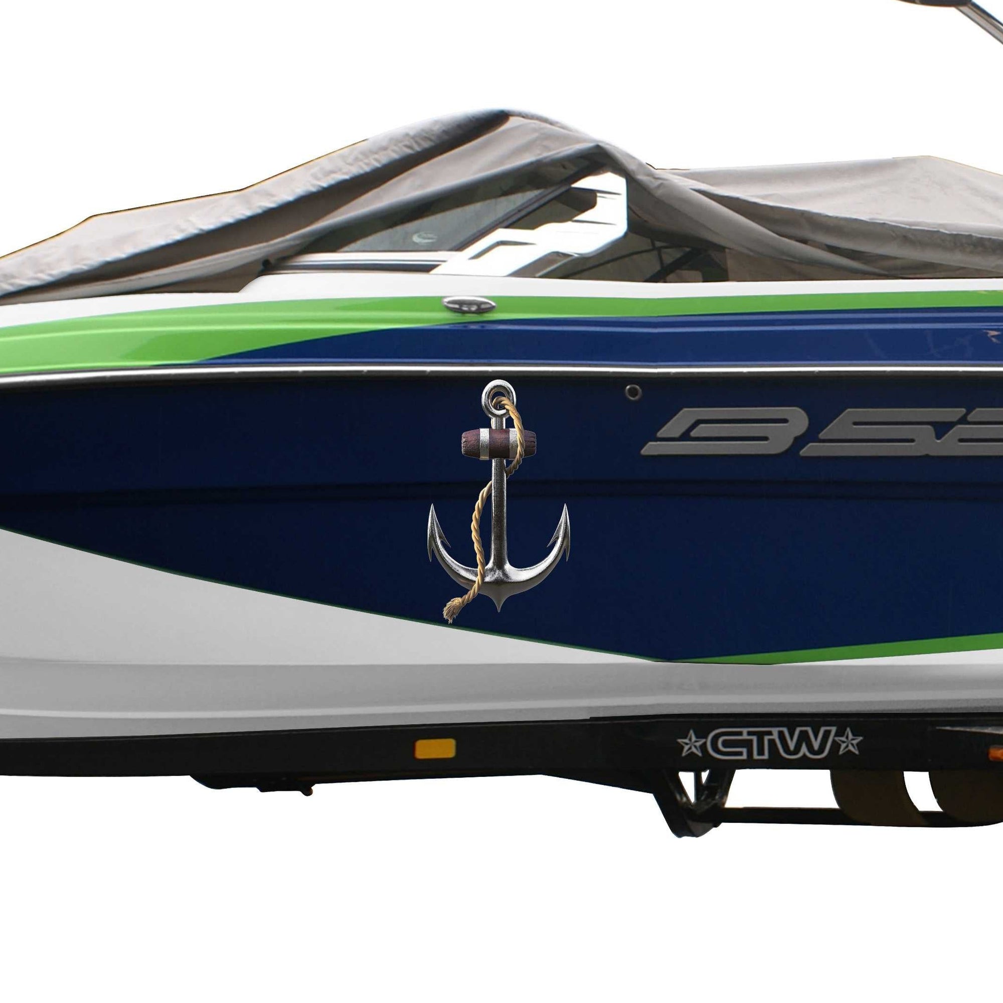 White boat with Silver anchor decal on the side of it