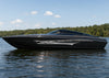black boat with silver shark race decal stripe on hull