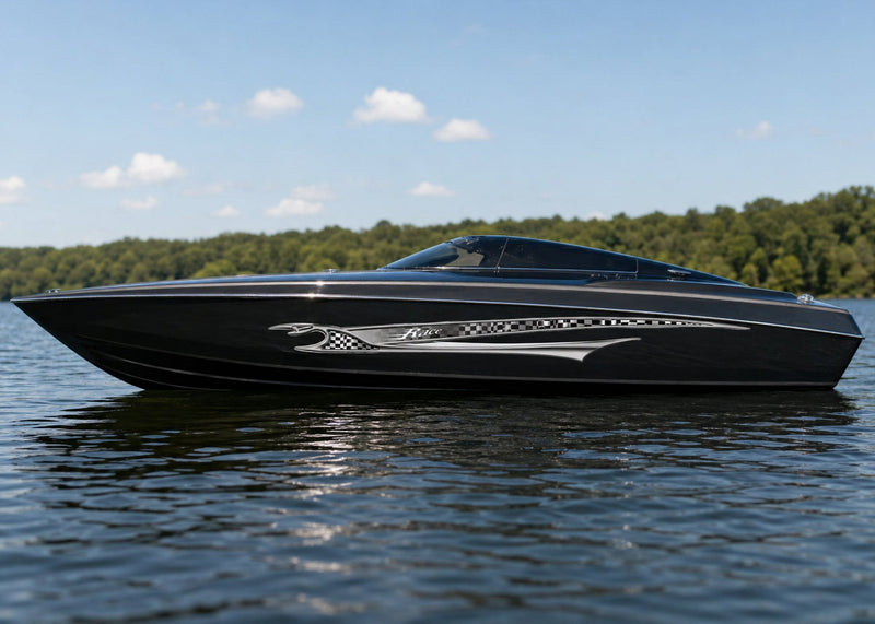 black boat with silver shark race decal stripe on hull