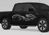 black pickup with Steel Dragon vinyl decal on passenger side