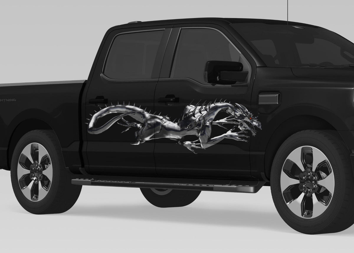 black pickup with Steel Dragon vinyl decal on passenger side