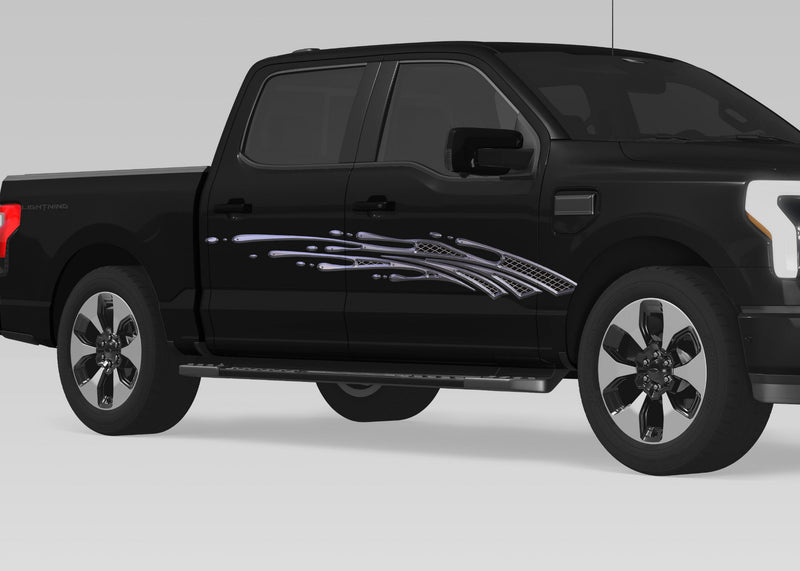 black pickup with metal style mud splash vinyl graphics on passenger side