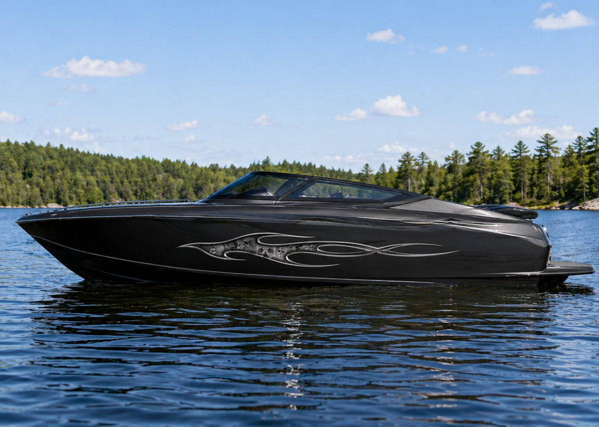 black speed boat with inflame skulls vinyl graphics on hull
