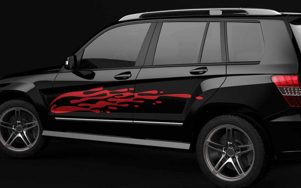 black suv with red mud splash vinyl cut decal on its driver side