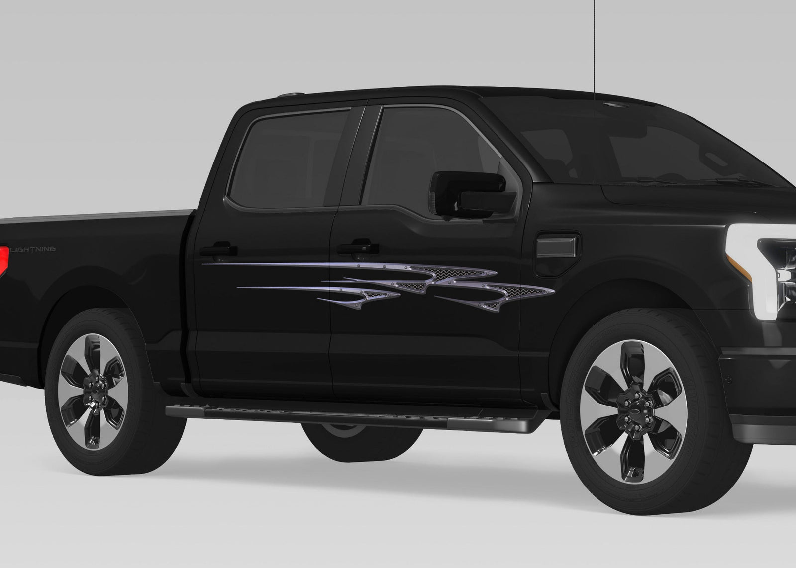 black truck with Grille Spear Stripe vinyl graphics on passenger side
