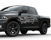 black truck with grey Oni Ryu Winged dragon decal on its cab side