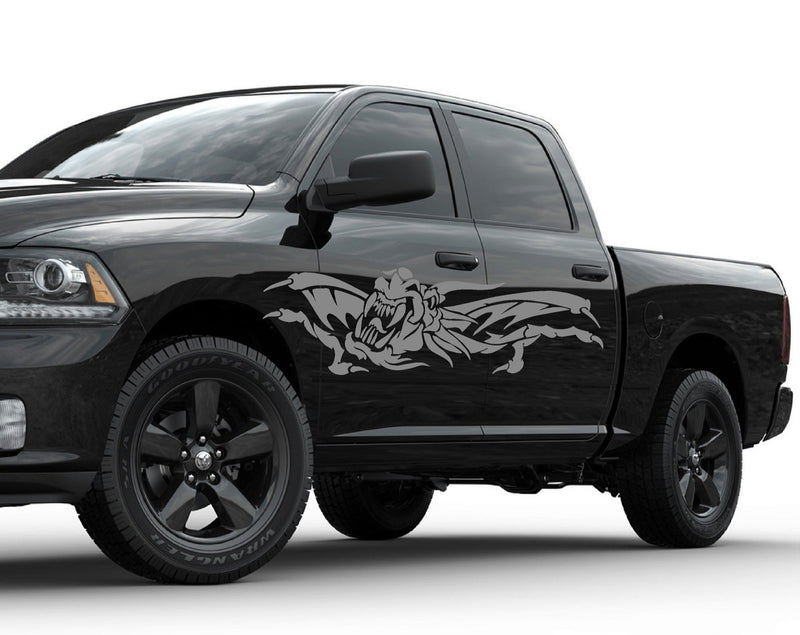 black truck with grey Oni Ryu Winged dragon decal on its cab side