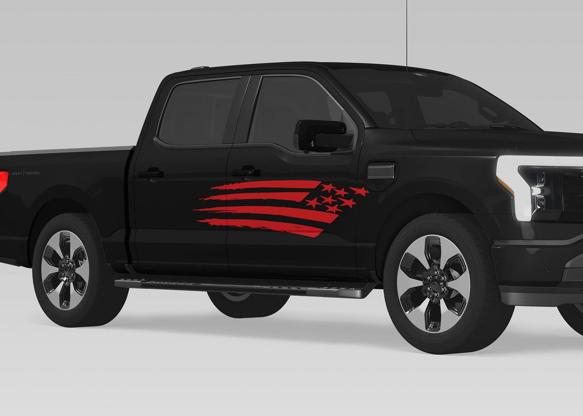 black truck with red american distrised flag decal on passenger side