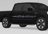 black truck with metal style tribal flames vinyl graphics on driver side