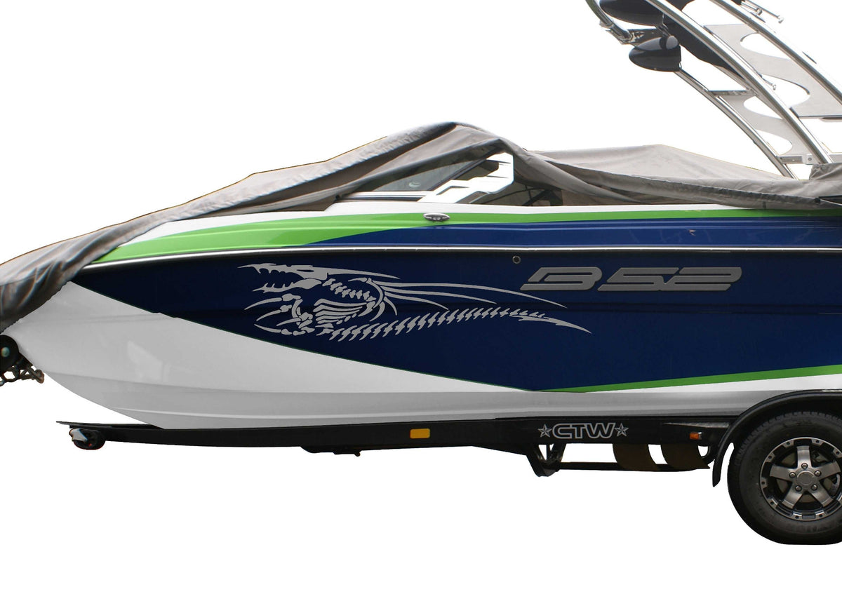 blue boat with silver dragon bones vinyl decal on port side